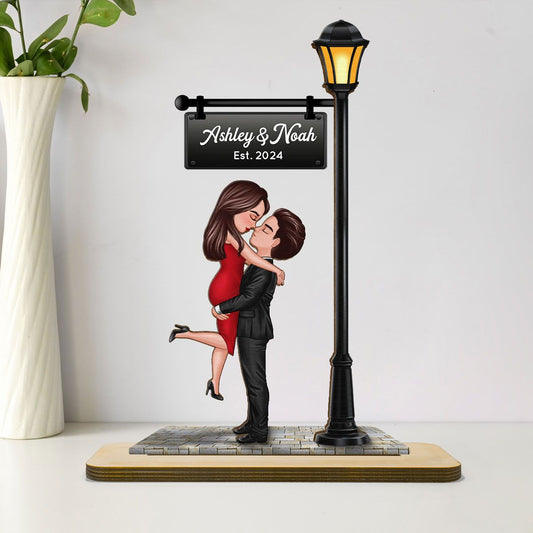 Couple Kissing Under Lamp Post